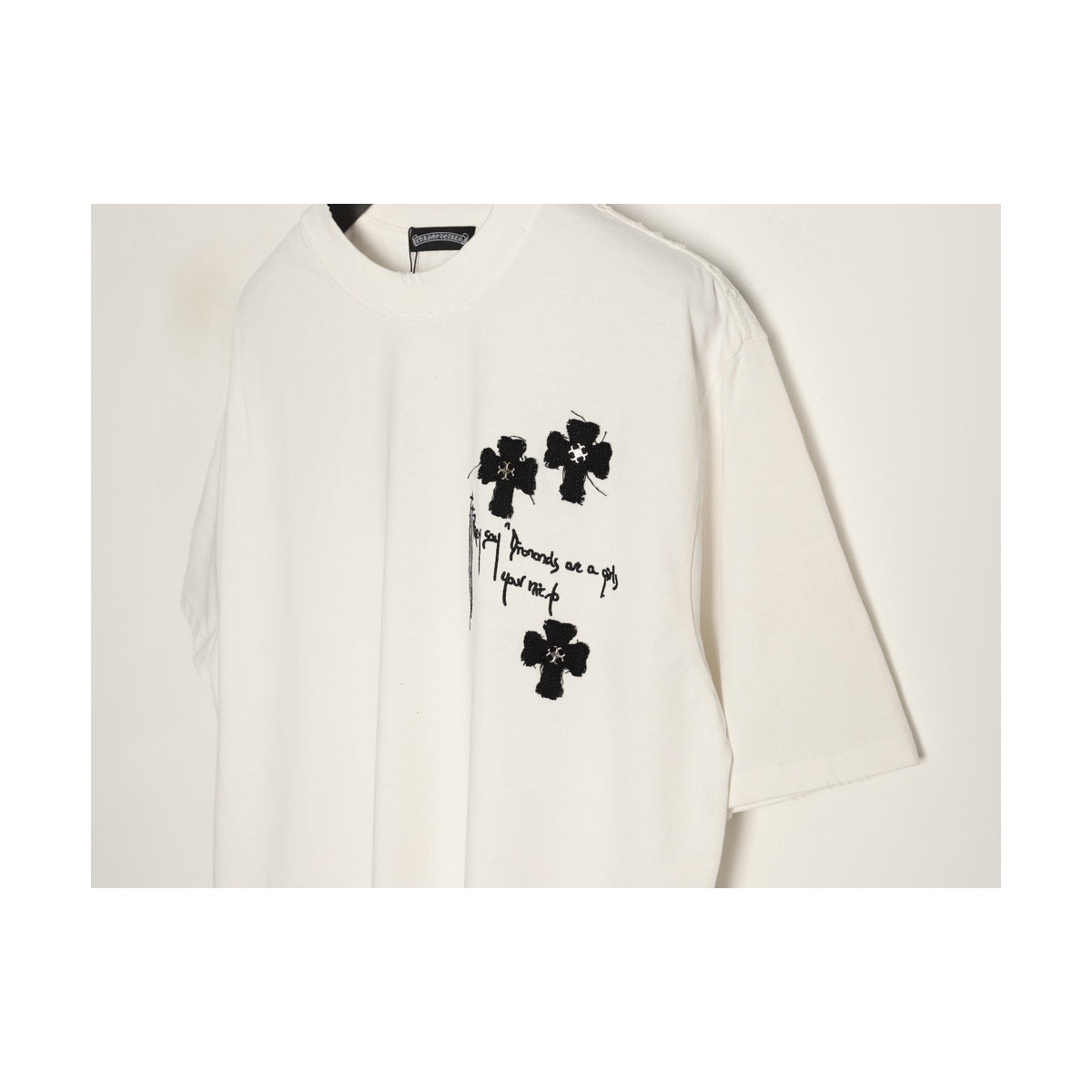 Chrome Hearts three-cross chest graphic detail
