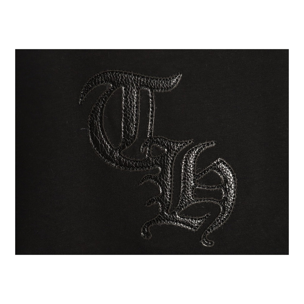 Chrome Hearts tonal Gothic monogram chest detail