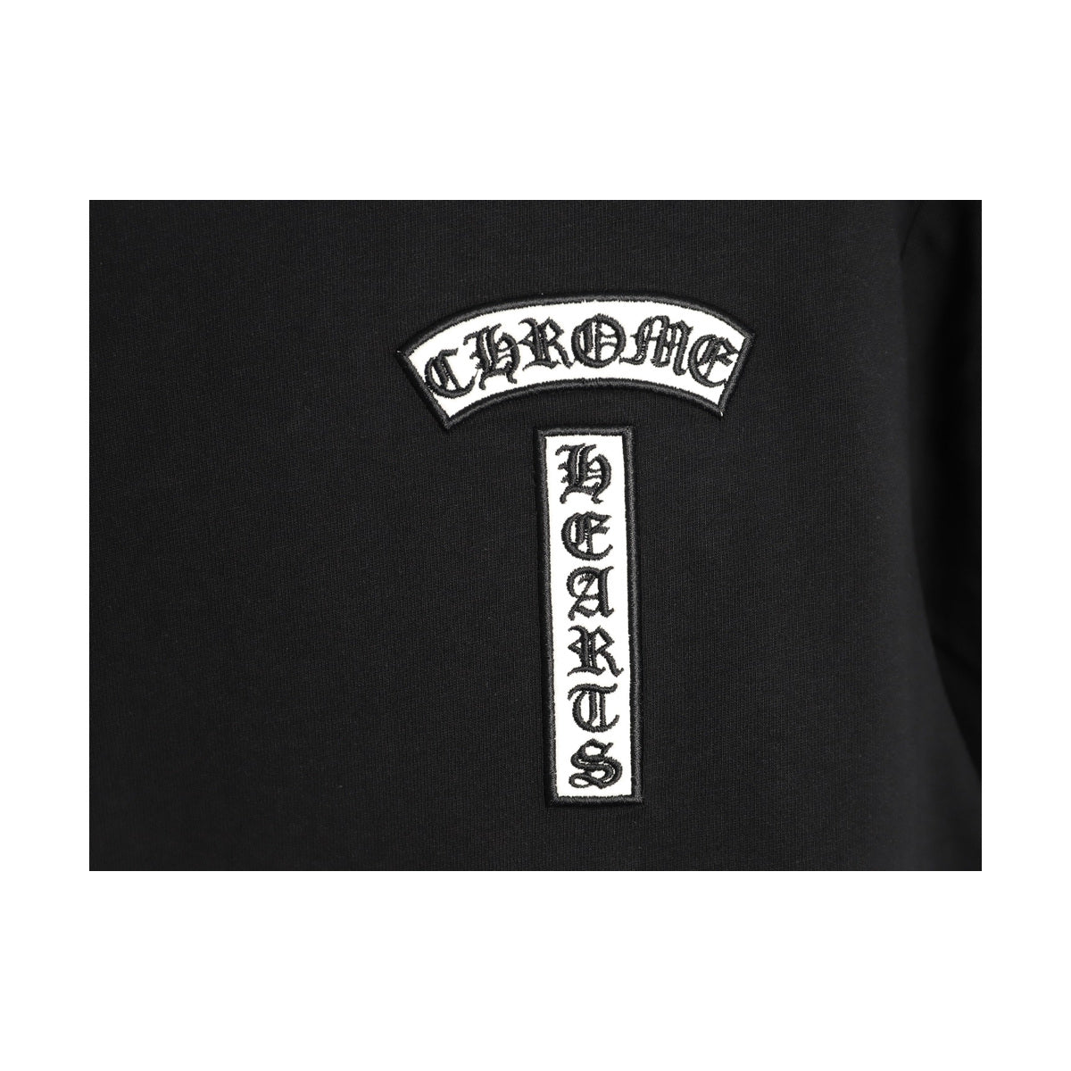 Chrome Hearts white chest emblem embroidery detail on black