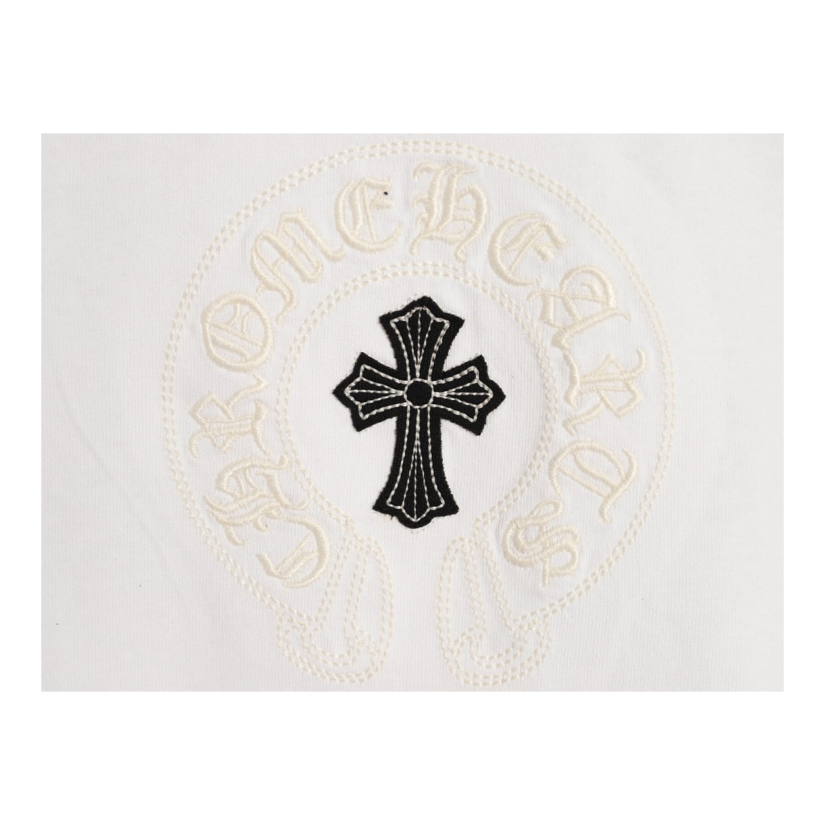 Chrome Hearts chest cross and Gothic script detail