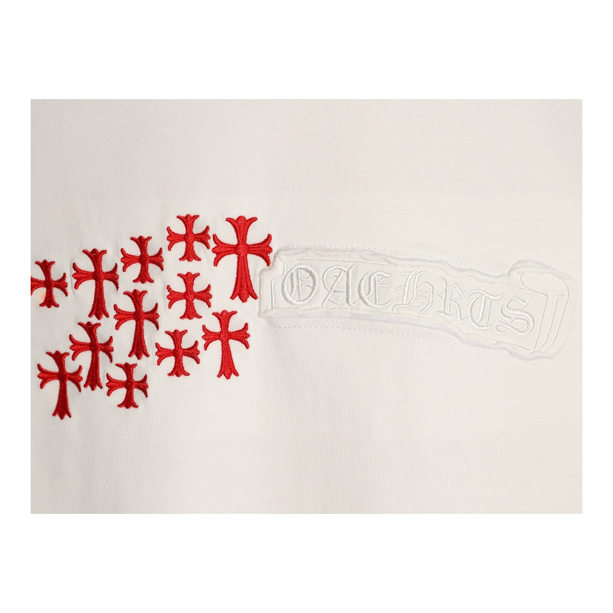 Chrome Hearts red cross chest applique detail