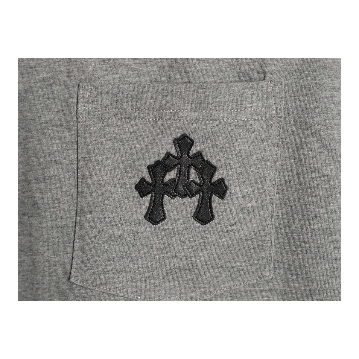 Chrome Hearts black leather chest monogram detail on gray