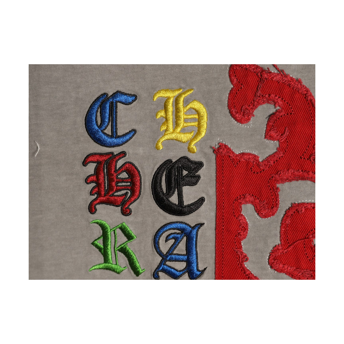 Multicolor embroidered letter and emblem detail