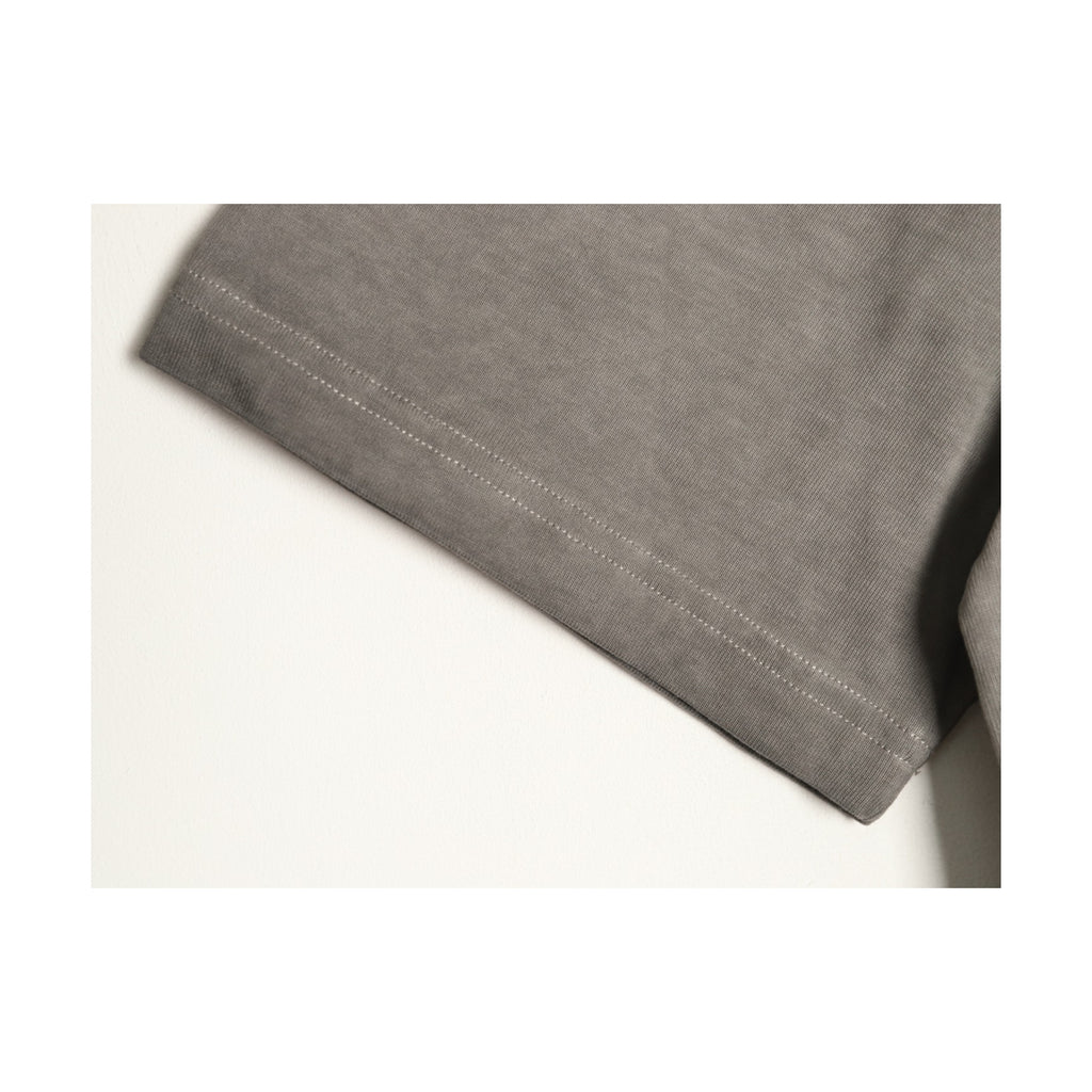 Washed grey jersey fabric and seam detail