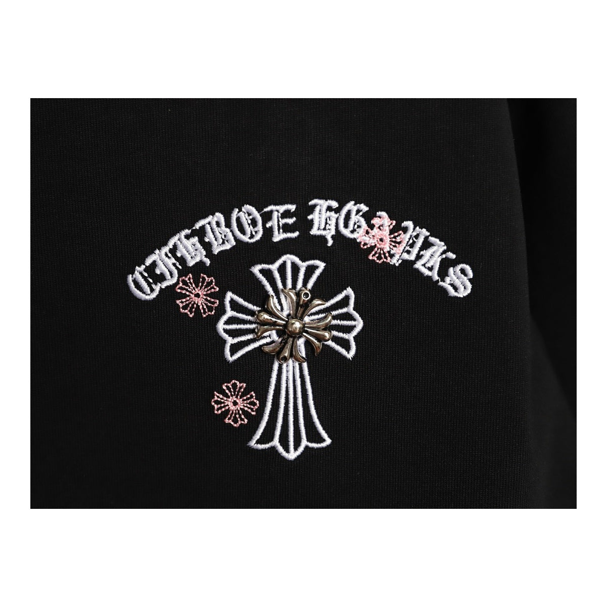 Chrome Hearts chest cross embroidery detail on black