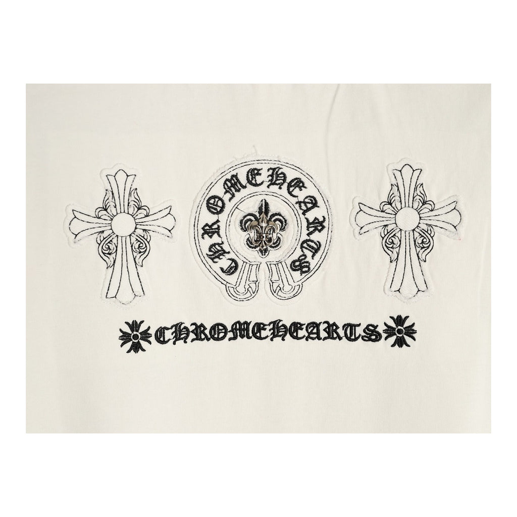 Chrome Hearts cross and horseshoe back embroidery detail on cream