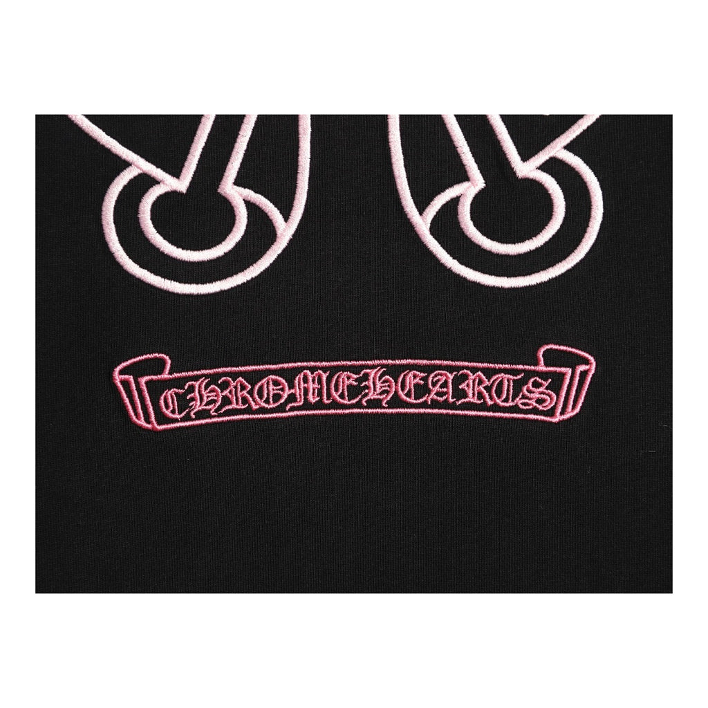 Chrome Hearts pink Gothic script back embroidery detail on black