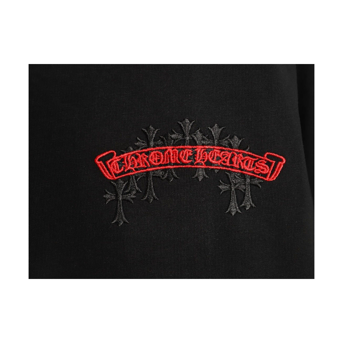Chrome Hearts chest banner embroidery detail on black