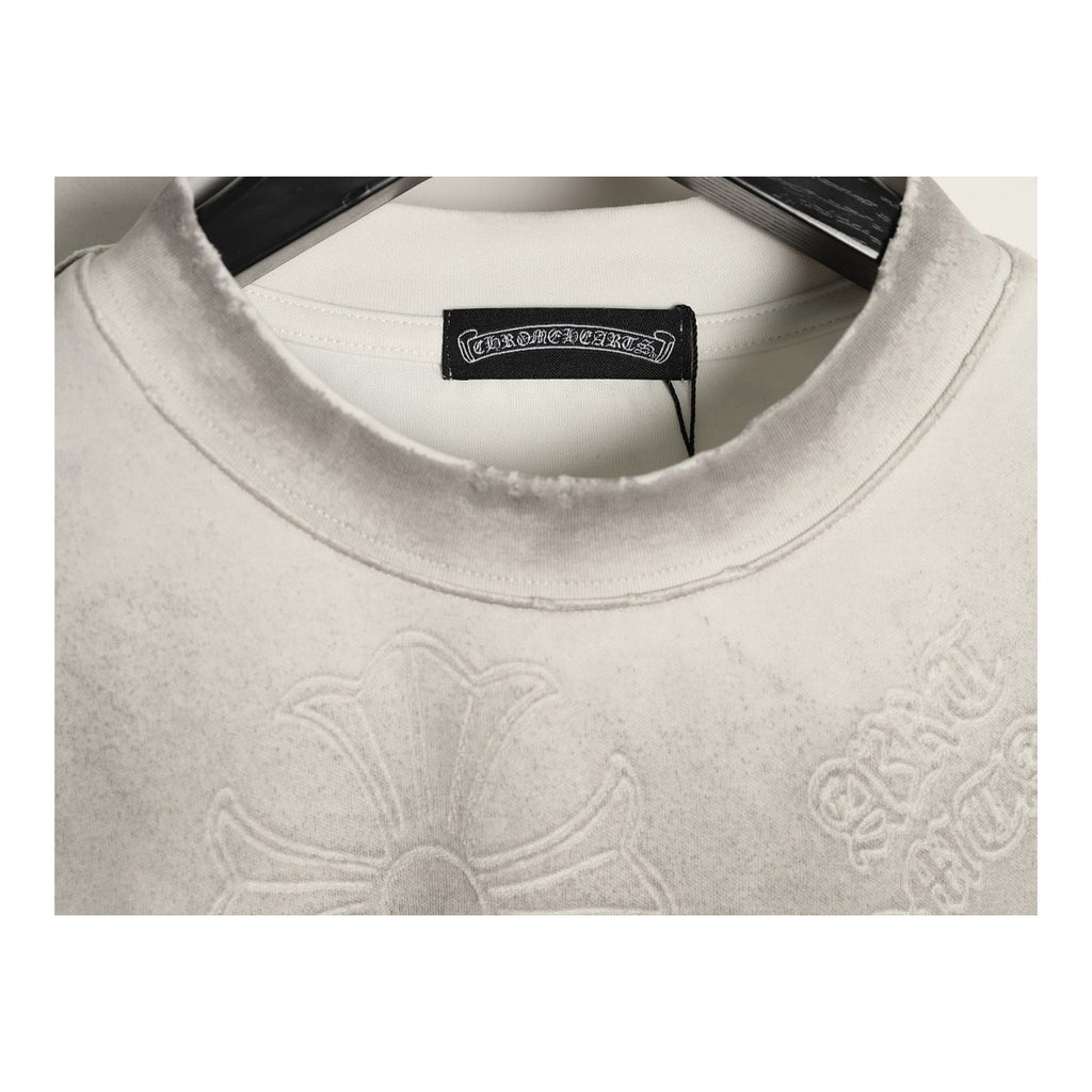 Chrome Hearts distressed collar and laser-burn motif detail