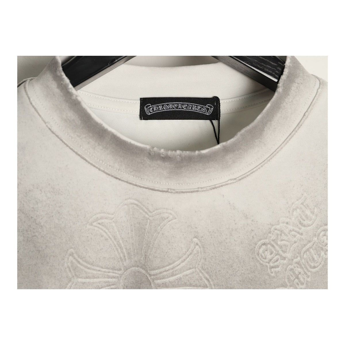 Chrome Hearts distressed collar and laser-burn motif detail
