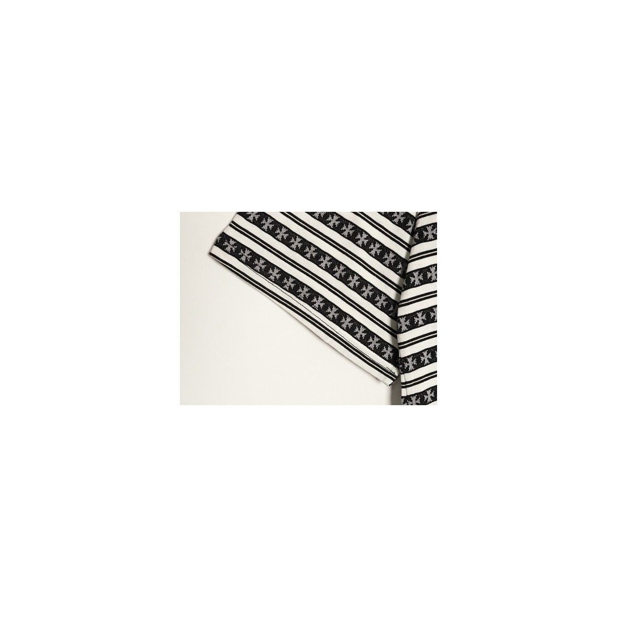 Chrome Hearts black and white striped sleeve construction detail