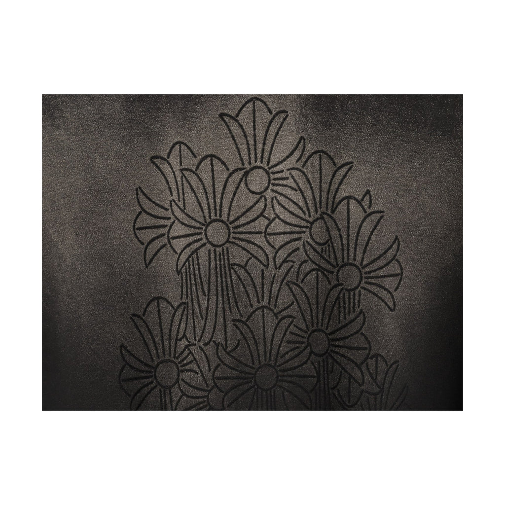 Chrome Hearts laser-burned floral cross graphic detail